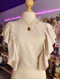 BLUSA CON OLANES "BEIGE"