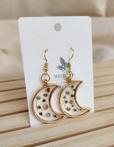 ARETES CON BISEL NATURALEZA MUERTA "LUNA"